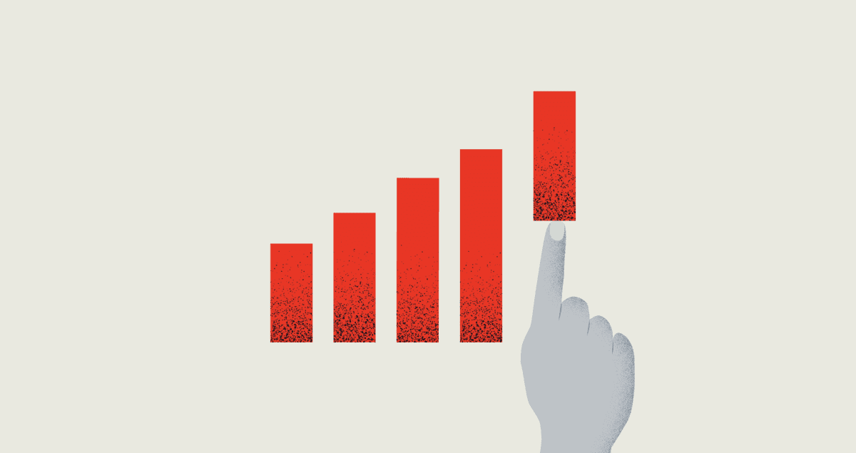 Hand lifting the tallest bar on a growth chart — pushing distribution results above the baseline.